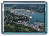 An undated (pre-1994) photo of Ashibe harbour.  The large flat rice fields near the top middle of the picture are now the site of the Daiei supermarket