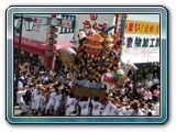 Fertility shrine annual festival - Yes, that is what you think on the left of the float