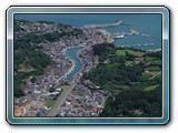 Seto Harbour - this aerial shot of Seto Harbour near Ashibe port shows that despite the low population density on the island, the main settlements are often crammed into small areas.  Local fisherman tightly cram their fishing boats into the narrow channel in the middle of the picture when typhoons are approaching