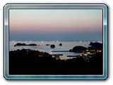 Yunomoto hot spring resort - note the boats on the horizon with bright lights to attract squid - a common sight on the island